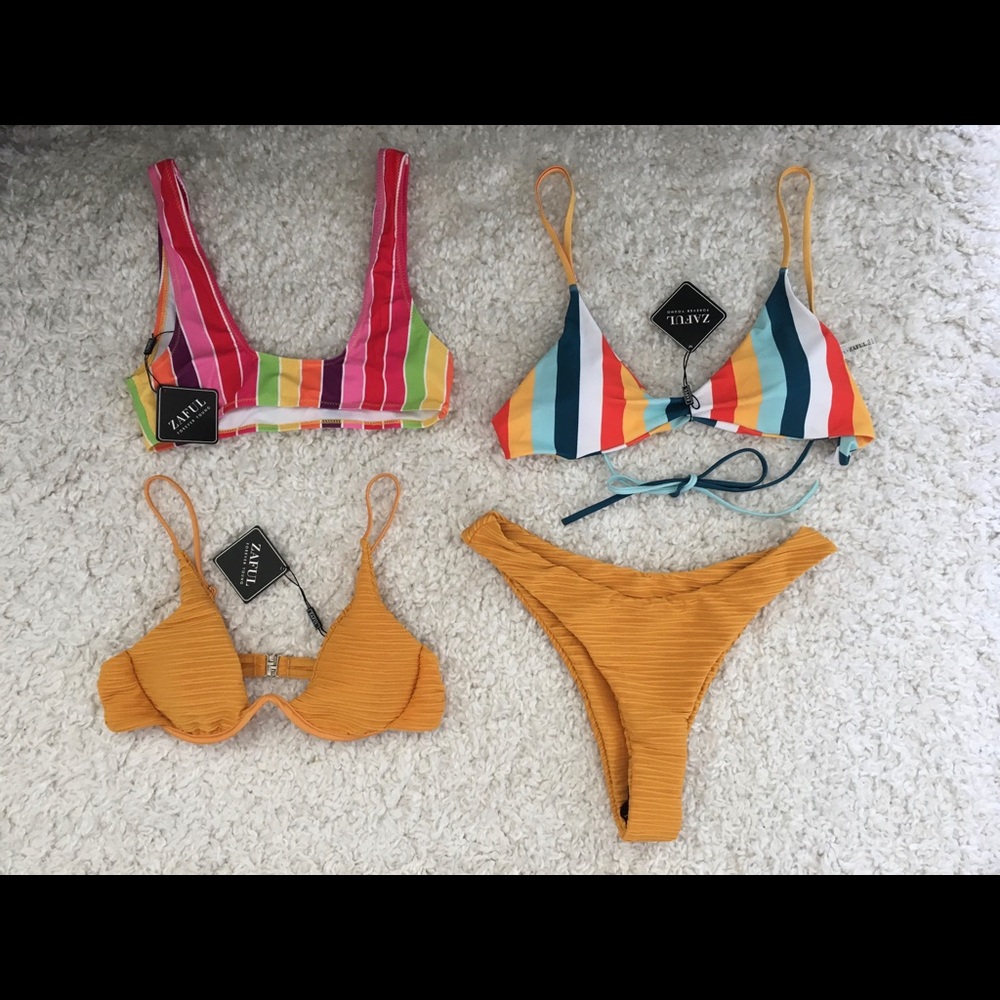 3 brand new bikini tops and 1 bottom